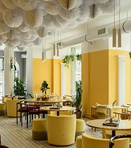 Modern yellow interior design of a cafe